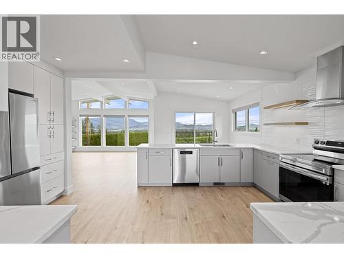 Stunning views from the generous chef's kitchen - 1315 Dehart Road, Kelowna, BC 