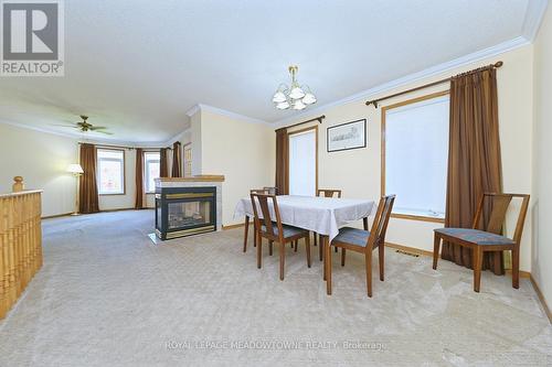 16 Harrop Avenue, Halton Hills, ON - Indoor Photo Showing Dining Room With Fireplace