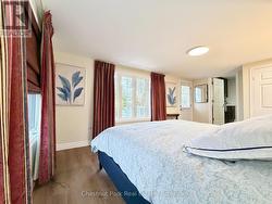 Primary bdrm with walkout to lakeside deck - 