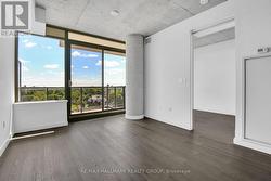 Sliding glass doors to sizeable balcony space. - 