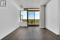 Bright Living space with hardwood floors - 