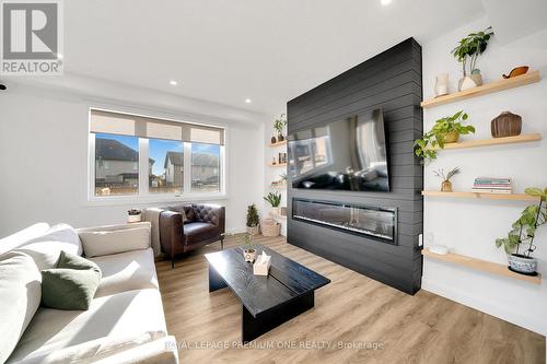 207 Schmidt Drive, Wellington North, ON - Indoor Photo Showing Living Room With Fireplace
