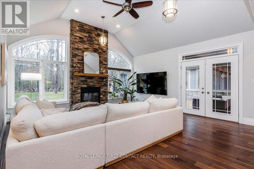 3500 Crescent Harbour Road, Innisfil, ON - Indoor Photo Showing Living Room With Fireplace