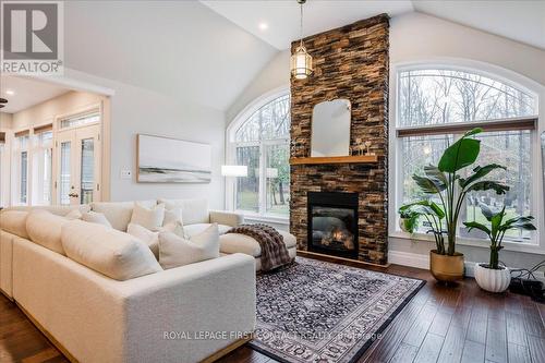 3500 Crescent Harbour Road, Innisfil, ON - Indoor Photo Showing Living Room With Fireplace