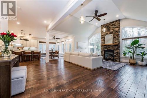 3500 Crescent Harbour Road, Innisfil, ON - Indoor Photo Showing Living Room With Fireplace