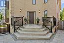 Grand front entry with elevated porch - 99 Abitibi Avenue, Toronto, ON 