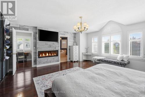 31 Commando Court, Hamilton, ON - Indoor Photo Showing Bedroom With Fireplace
