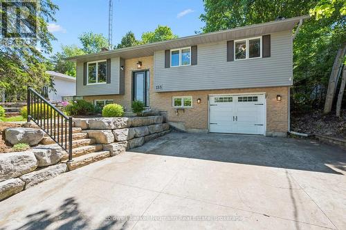4 car driveway leads to armor stone raised entry - 153 Harris Street, Guelph/Eramosa (Rockwood), ON 