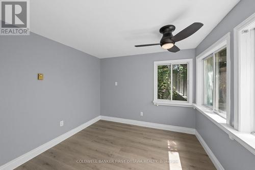Back leftcorner bedroom w wall to wall windows. - 1246 Kitchener Avenue, Ottawa, ON 
