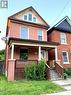Brick residence featuring a covered front porch - 343 Cumberland Avenue, Hamilton, ON 