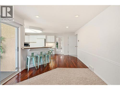 Cozy family area off the kitchen. - 756 Springrose Way, Kelowna, BC 