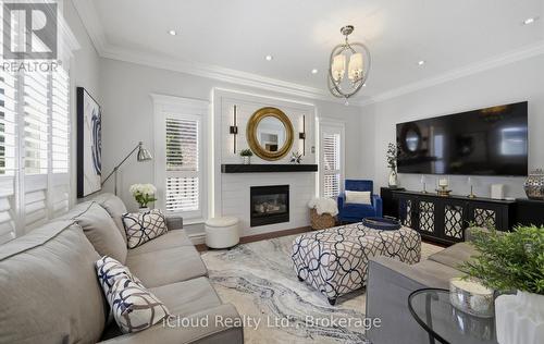 7 Gagnon Gate, Whitby, ON - Indoor Photo Showing Living Room With Fireplace