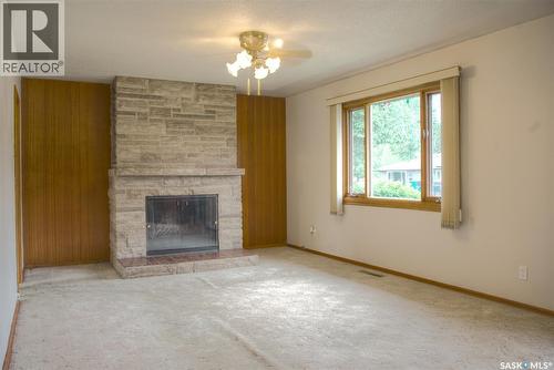806 Cascade Street, Saskatoon, SK - Indoor Photo Showing Living Room With Fireplace