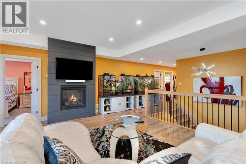 5 John Pound Road Unit# 22, Tillsonburg, ON - Indoor Photo Showing Living Room With Fireplace