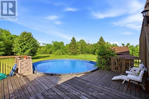 4446 Stonecrest Road, Ottawa, ON - Outdoor With Above Ground Pool With Deck Patio Veranda With Backyard