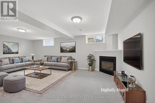 Virtually staged - 407 Flora Street, Carleton Place, ON - Indoor Photo Showing Living Room With Fireplace