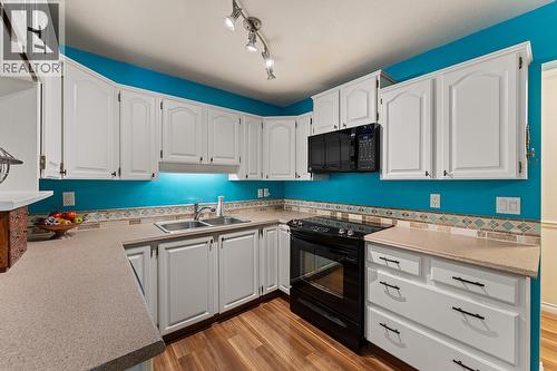 1534 Lawrence Avenue Unit# 304, Kelowna, BC - Indoor Photo Showing Kitchen With Double Sink