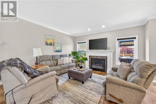 58 Postma Drive, Haldimand, ON - Indoor Photo Showing Living Room With Fireplace