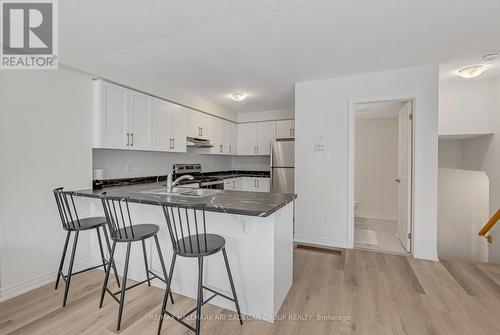 Breakfast Bar - 61 Dryden Lane, Hamilton, ON - Indoor Photo Showing Kitchen