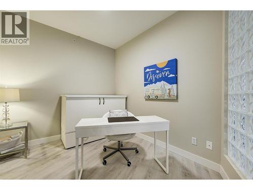 Second bedroom (DEN/OFFICE) with cabinet bed (no closet) - 1960 Enterprise Way Unit# 412, Kelowna, BC - Indoor Photo Showing Office