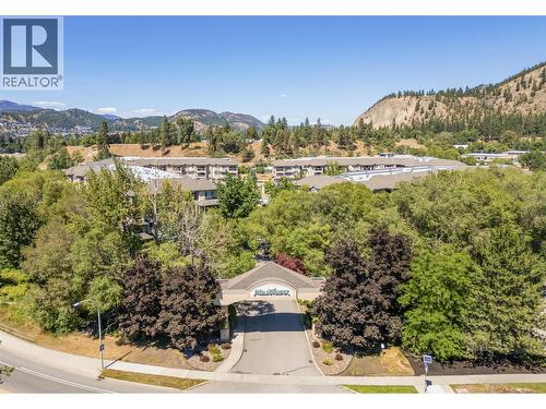Main entrance to Meadow Brook Estates - 1960 Enterprise Way Unit# 412, Kelowna, BC - Outdoor With View