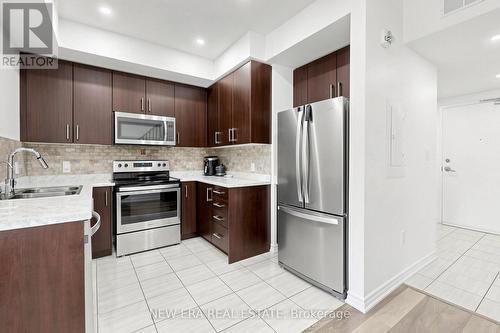216 - 3865 Major Mackenzie Drive W, Vaughan, ON - Indoor Photo Showing Kitchen With Double Sink