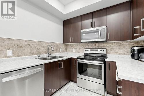 216 - 3865 Major Mackenzie Drive W, Vaughan, ON - Indoor Photo Showing Kitchen With Double Sink With Upgraded Kitchen