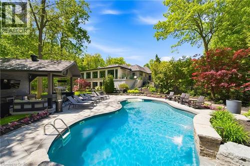 3205 Highpoint Court, Burlington, ON - Outdoor With In Ground Pool With Deck Patio Veranda With Backyard