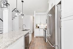 Double sinks in kitchen island. - 