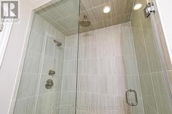 Shower in primary ensuite. - 