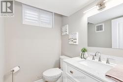 Lower level powder room. - 