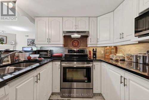 103 - 311 Water Street W, Cornwall, ON - Indoor Photo Showing Kitchen With Double Sink