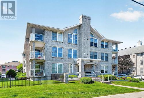 103 - 311 Water Street W, Cornwall, ON - Outdoor With Balcony With Facade