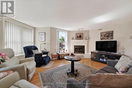 103 - 311 Water Street W, Cornwall, ON - Indoor Photo Showing Living Room With Fireplace