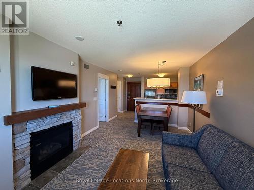 353 - 156 Jozo Weider Boulevard, Blue Mountains, ON - Indoor Photo Showing Living Room With Fireplace