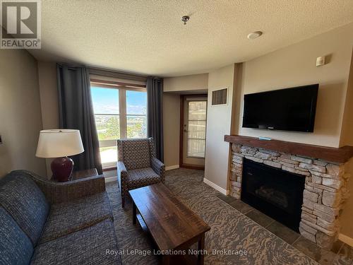 353 - 156 Jozo Weider Boulevard, Blue Mountains, ON - Indoor Photo Showing Living Room With Fireplace