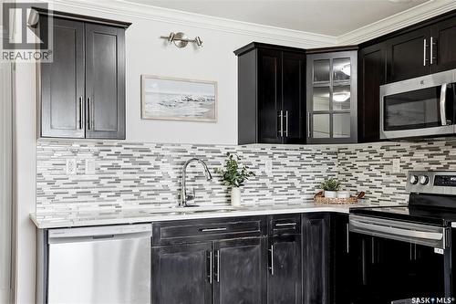 409 225 Hassard Close, Saskatoon, SK - Indoor Photo Showing Kitchen With Upgraded Kitchen