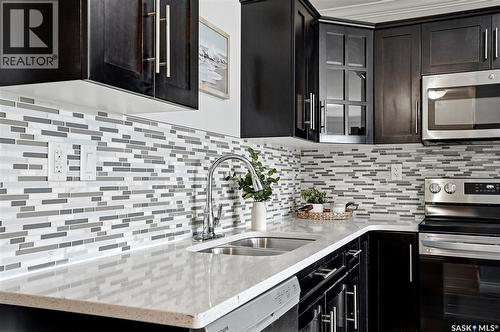 409 225 Hassard Close, Saskatoon, SK - Indoor Photo Showing Kitchen With Double Sink With Upgraded Kitchen