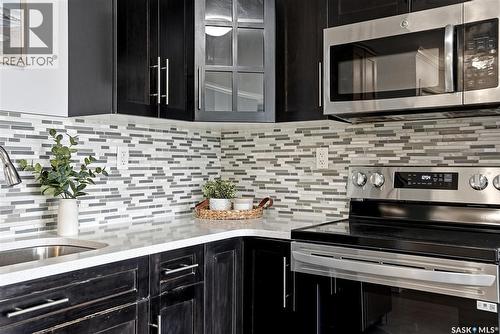 409 225 Hassard Close, Saskatoon, SK - Indoor Photo Showing Kitchen With Upgraded Kitchen