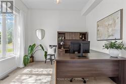 Bright, private home office at entrance - 