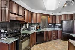 Custom kitchen with lots of creative storage - 