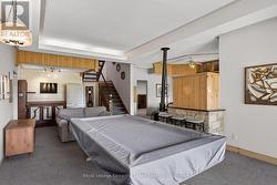 Great room w/propane fireplace and high ceilings - 