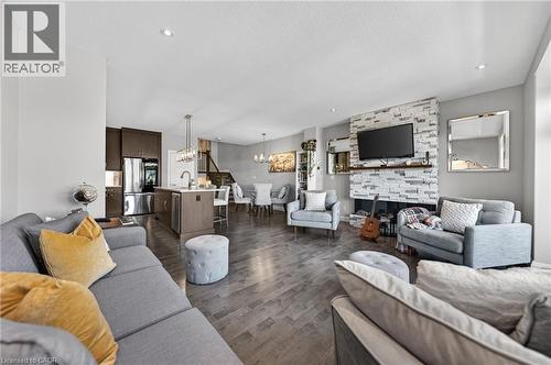 243 Grey Silo Road Unit# 11, Waterloo, ON - Indoor Photo Showing Living Room With Fireplace