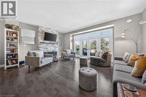 243 Grey Silo Road Unit# 11, Waterloo, ON - Indoor Photo Showing Living Room With Fireplace