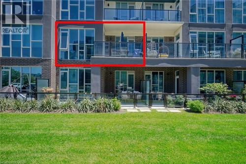 16 Concord Place Unit# 209, Grimsby, ON - Outdoor With Balcony With Facade