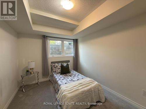 119 - 1081 Danforth Road, Toronto, ON - Indoor Photo Showing Bedroom