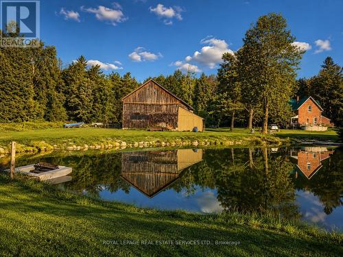 1351 Flos Rd 11 E, Springwater, ON - Outdoor With Body Of Water