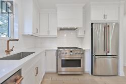 Chef's inspired Kitchen w 6 Burner Wolf Stove - 