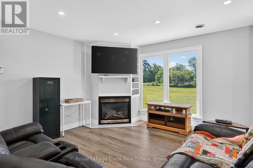 394 7Th Line Road, Douro-Dummer, ON - Indoor Photo Showing Living Room With Fireplace