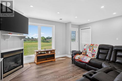 394 7Th Line Road, Douro-Dummer, ON - Indoor Photo Showing Living Room With Fireplace